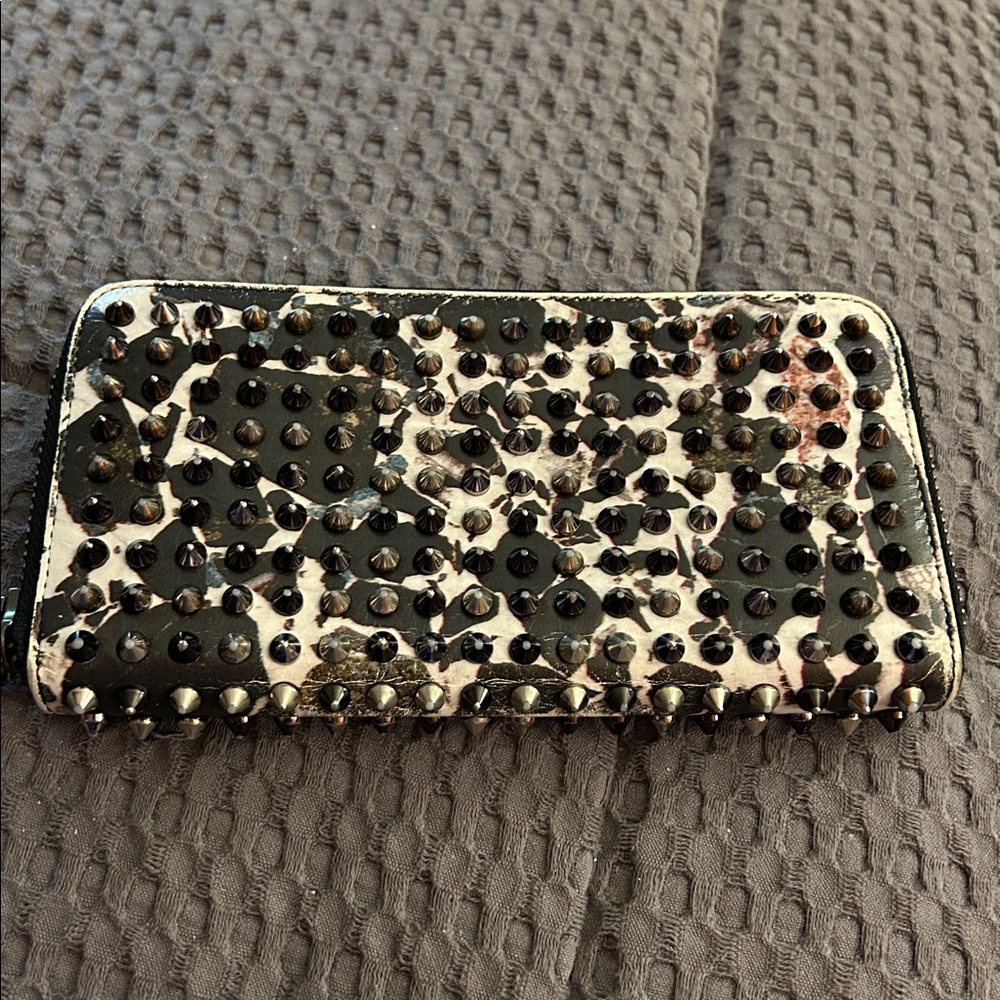 Christian Louboutin Black and Red Zip Wallet
Limited Edition